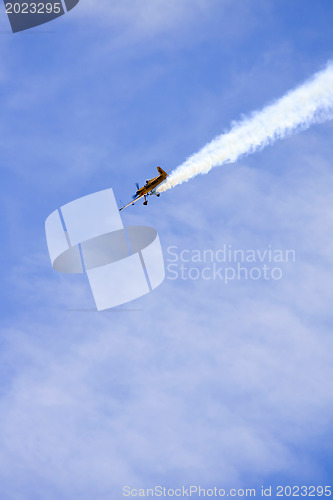 Image of A plane performing in an air show