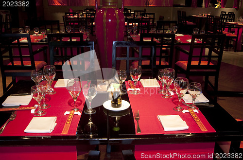 Image of Restoraunt table set awaiting guests