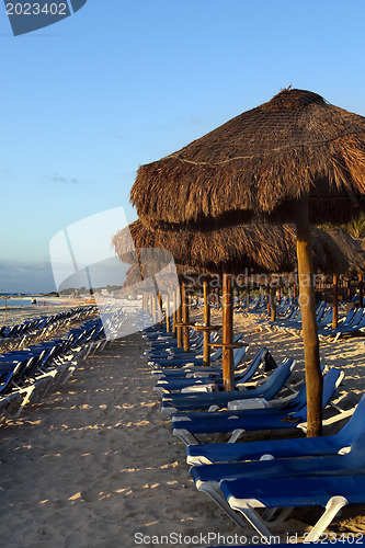 Image of Sraw umbrella at sandy beach