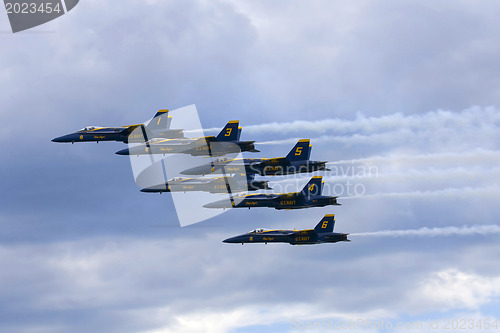 Image of Several  planes performing in an air show