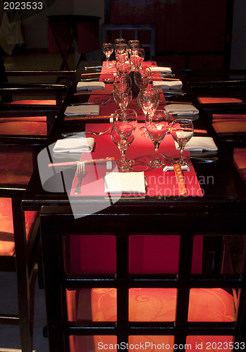 Image of Restoraunt table set awaiting guests