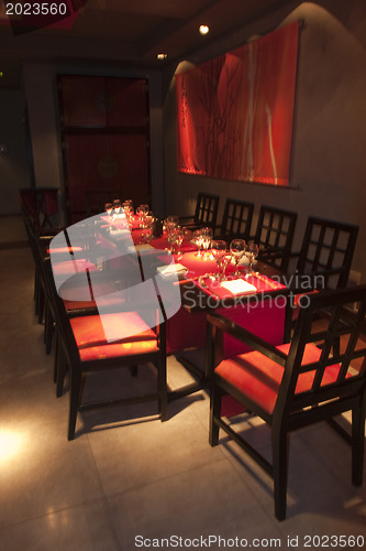 Image of Restoraunt table set awaiting guests