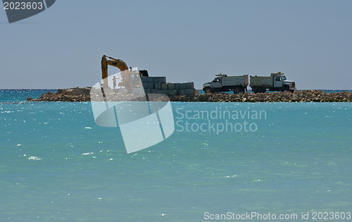 Image of Yellow Excavator at Work