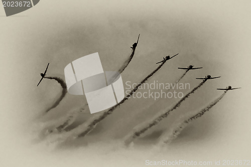 Image of Several  planes performing in an air show