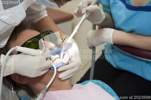 Image of Visit to the dentist. Dentist at work in dental room