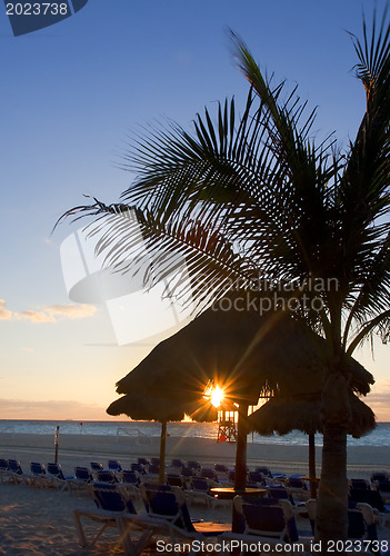 Image of Sraw umbrella at sandy beach