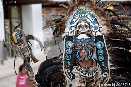 Image of  Shaman in Mexico with mystic looking mask.