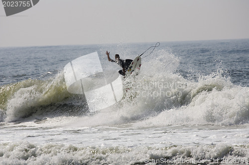 Image of Backlit surfer
