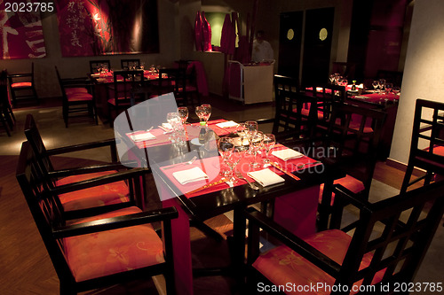 Image of Restoraunt table set awaiting guests