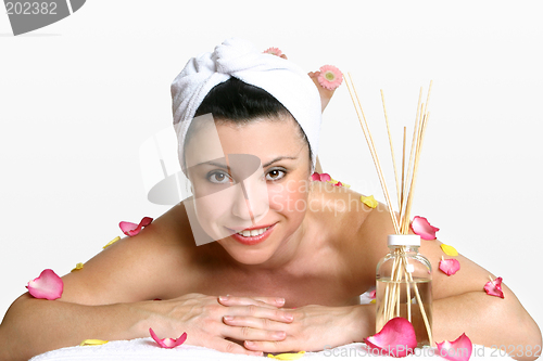 Image of Smiling woman day spa