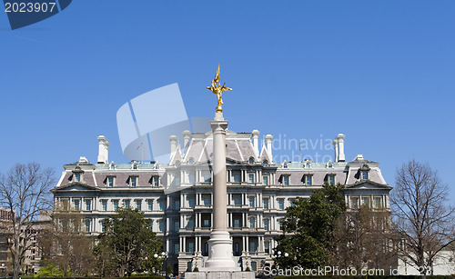 Image of Eisenhower Executive Office Building with First Division Monumen