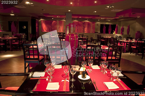 Image of Restoraunt table set awaiting guests