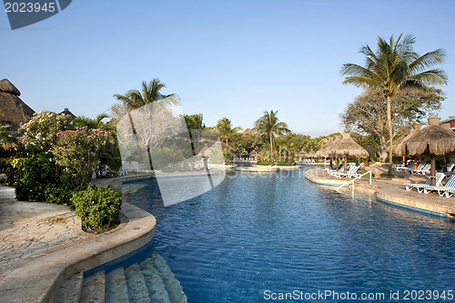 Image of Nice resort poolon sunny day