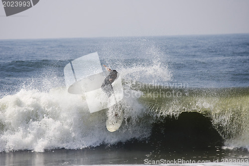 Image of Backlit surfer