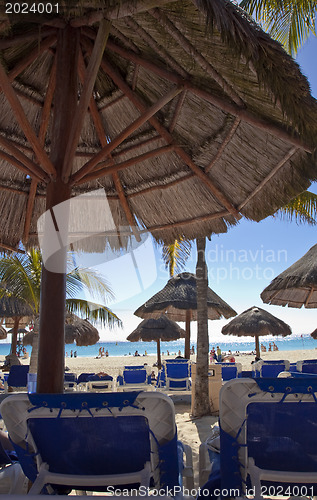 Image of Umbrellas and chairs on Caribbean beach