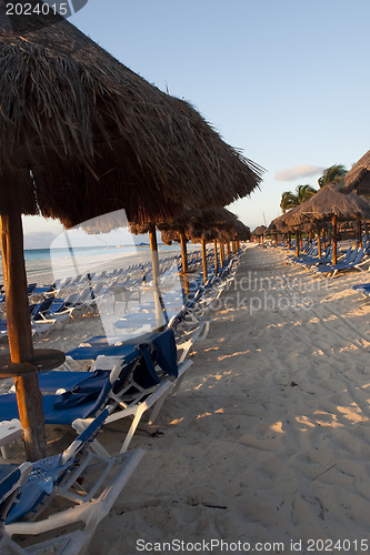 Image of Sraw umbrella at sandy beach