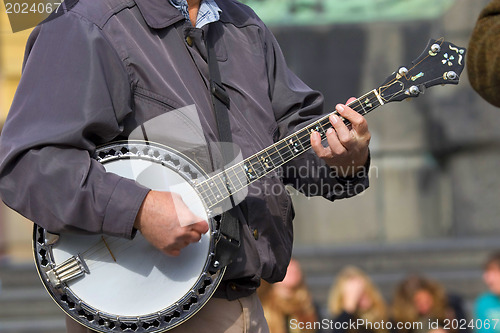 Image of The street musician. Expression