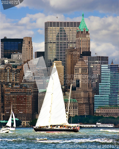 Image of Boat with white sails on Hudson river 