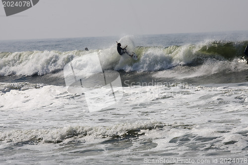 Image of Backlit surfer