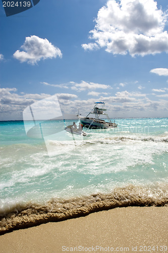 Image of Jetski is sailing near ailboat 