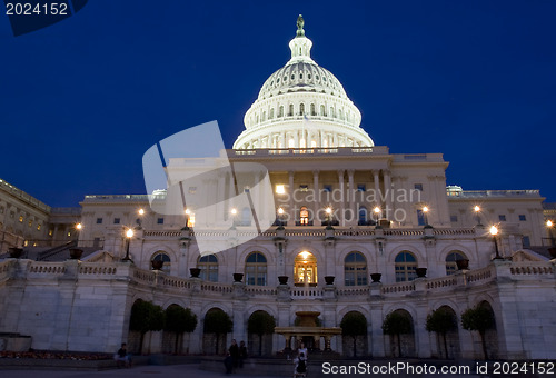 Image of The United States Capitol at night 