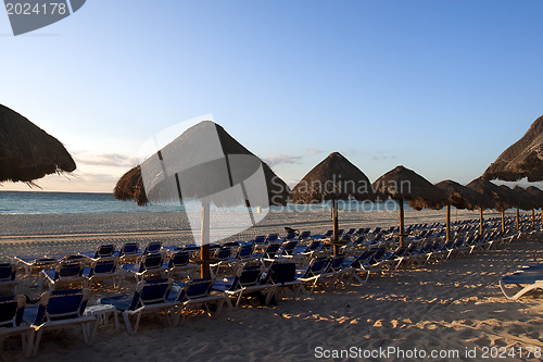 Image of Sraw umbrella at sandy beach