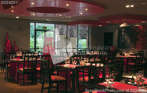Image of Restoraunt table set awaiting guests