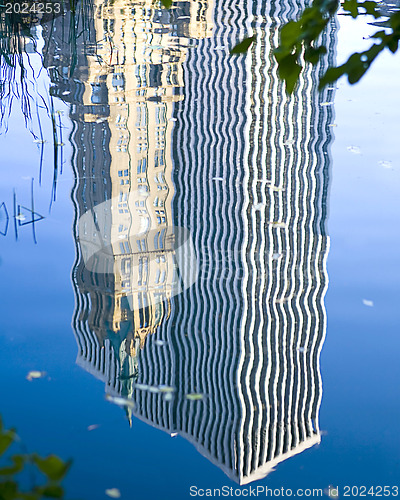 Image of City in reflection. Center Park NY . Beautiful park in beautiful