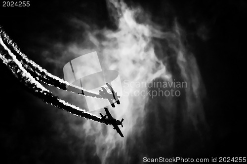 Image of Two planes performing in an air show