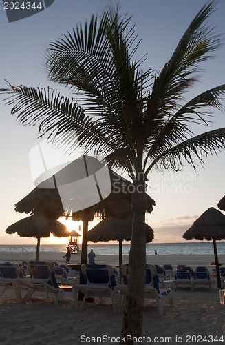 Image of Sraw umbrella at sandy beach