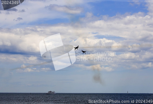 Image of Two planes performing in an air show