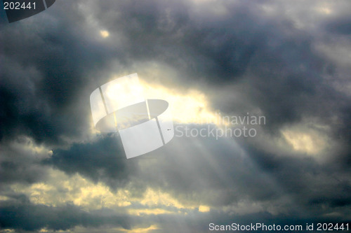 Image of sunlight through the clouds