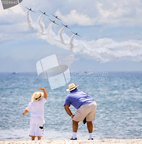 Image of Father and son on an airshow 