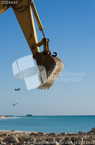 Image of Yellow Excavator at Work