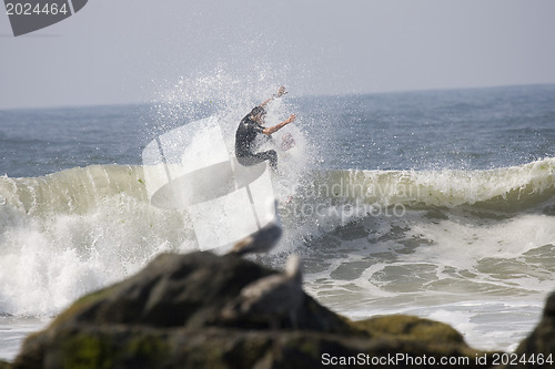 Image of Backlit surfer