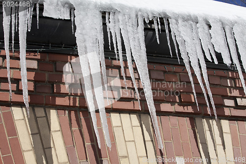 Image of Icecles hanging from roof