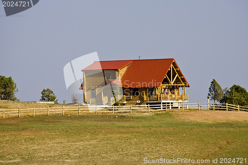Image of log house ranch
