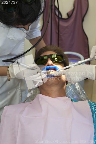 Image of Visit to the dentist. Dentist at work in dental room