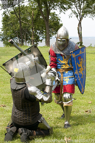 Image of PORT WASHINGTON, NY - JULY 11: Performers in sword fighting acti