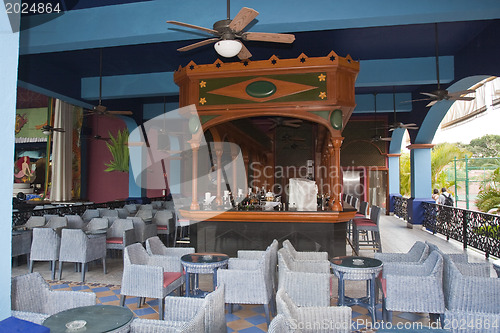 Image of Open resort restaurant with a bar stand