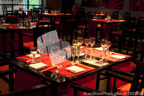 Image of Restoraunt table set awaiting guests