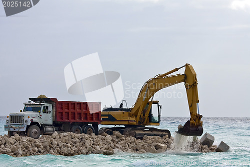 Image of Yellow Excavator at Work