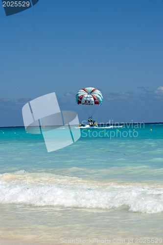 Image of Couple flys on a parachute 