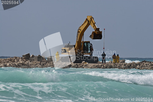 Image of Yellow Excavator at Work