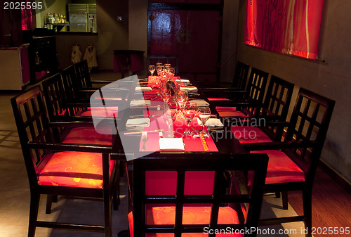 Image of Restoraunt table set awaiting guests