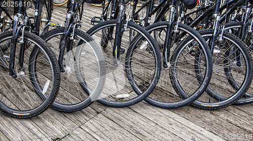 Image of Wheel detail of a group of bikes 