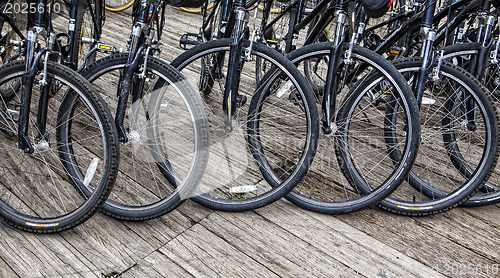 Image of Wheel detail of a group of bikes 