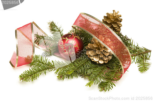 Image of Christmas Ornaments, Pine Cones, Red Ribbon and Pine Branches on
