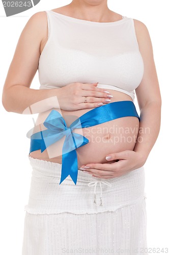 Image of Pregnant belly with blue ribbon