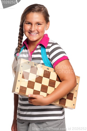 Image of Schoolgirl with chessboard